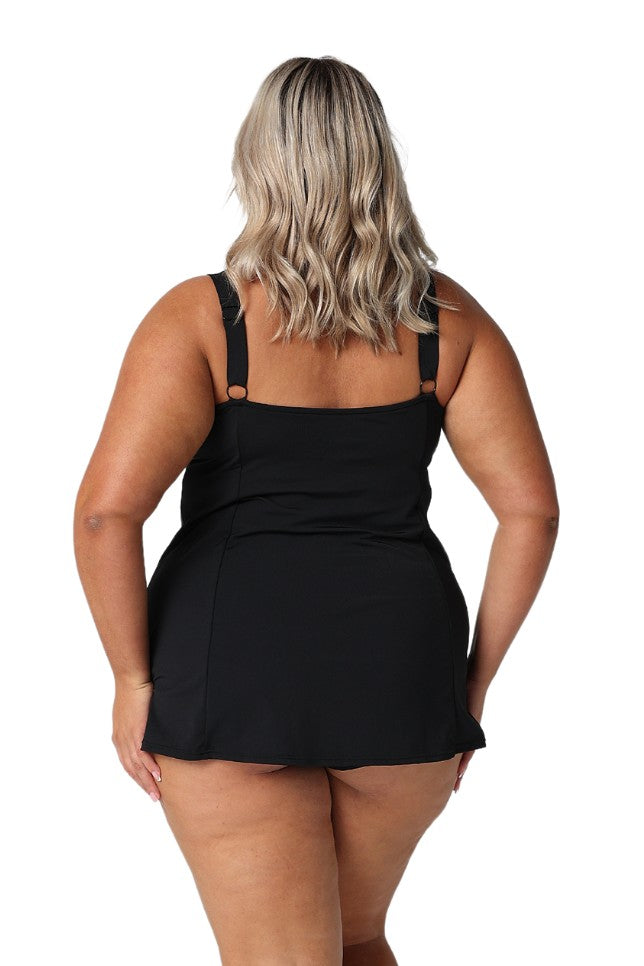 Model showing back of black floral womens swim dress