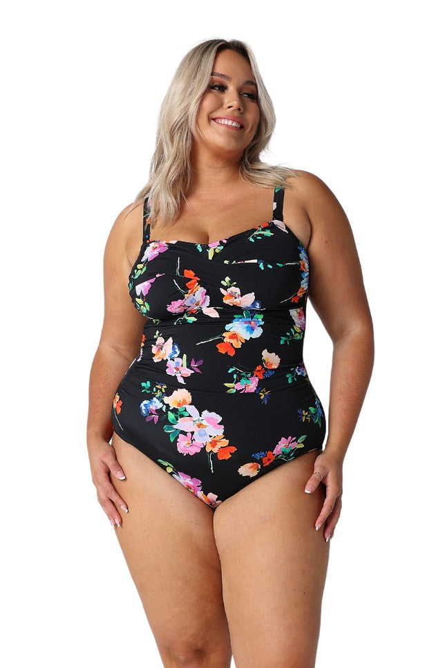 Model wearing black floral womens one piece swimsuit