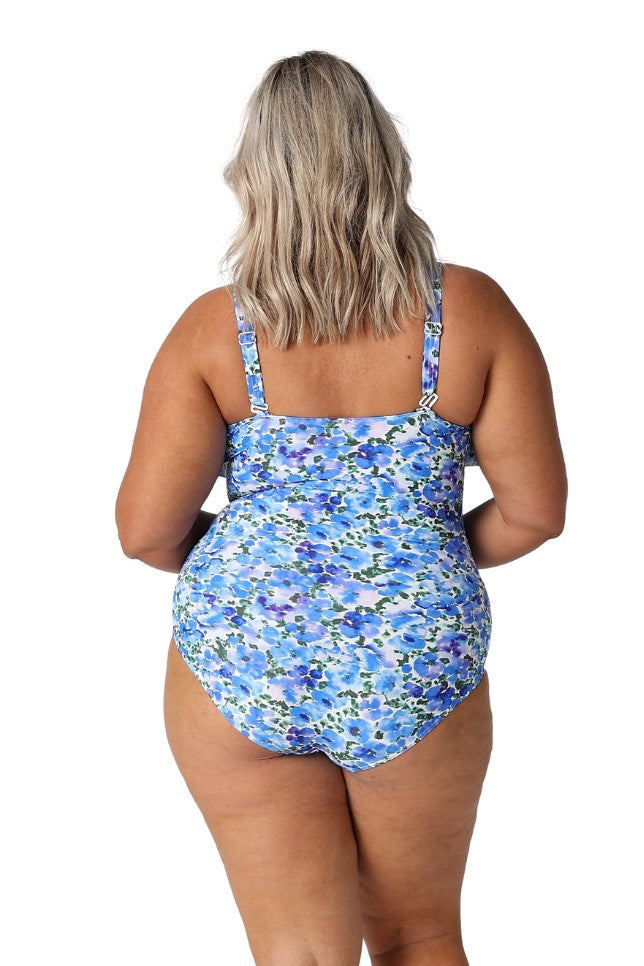 Model wearing blue floral frill v neck swimsuit