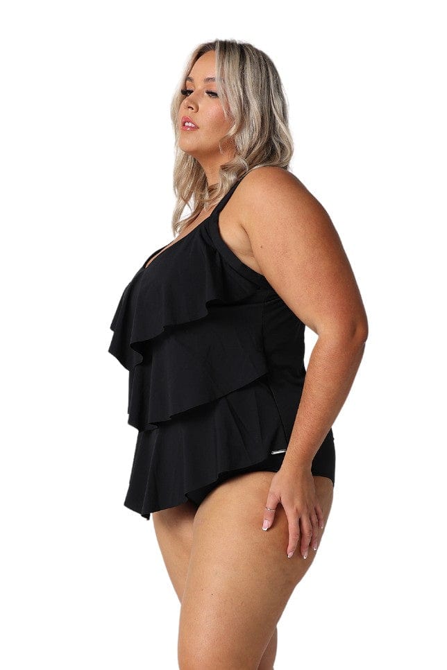 Model showing side of chlorine resistant black 3 tier tankini