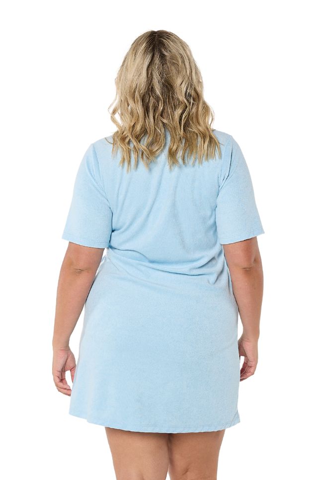 Model wearing short light blue terry towelling dress