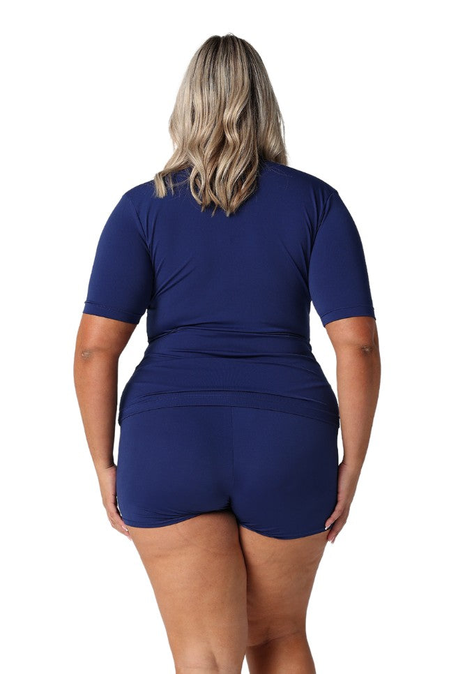 Model showing back of navy women's rash vest