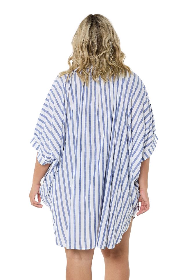 Model showing back of navy and white striped beach cover up