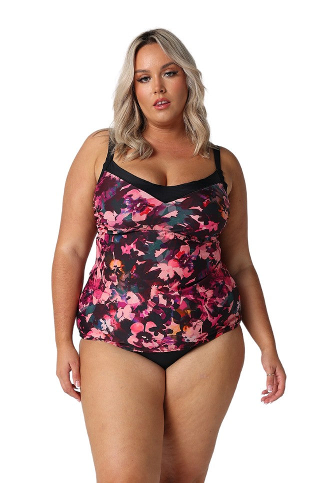 Model wearing pink and plum floral underwire tankini top