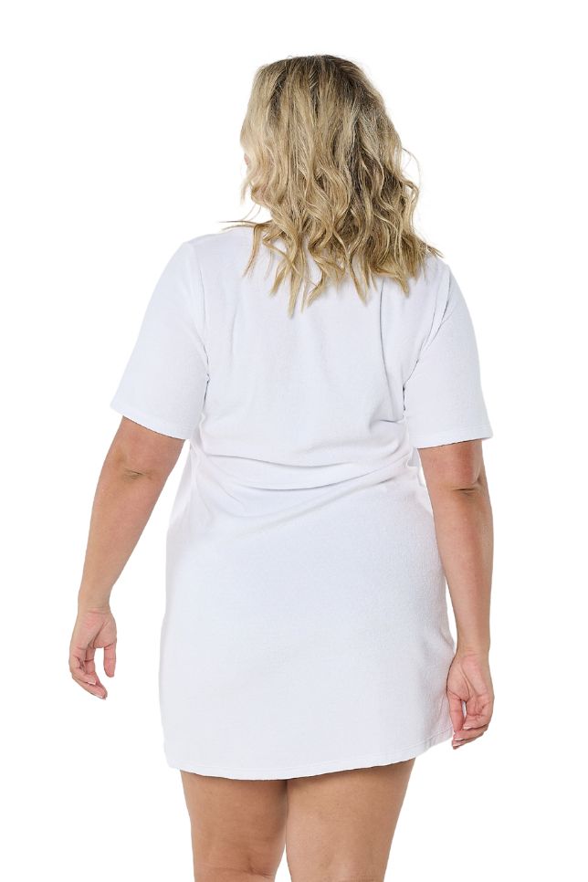 Model showing back of white terry towelling short dress