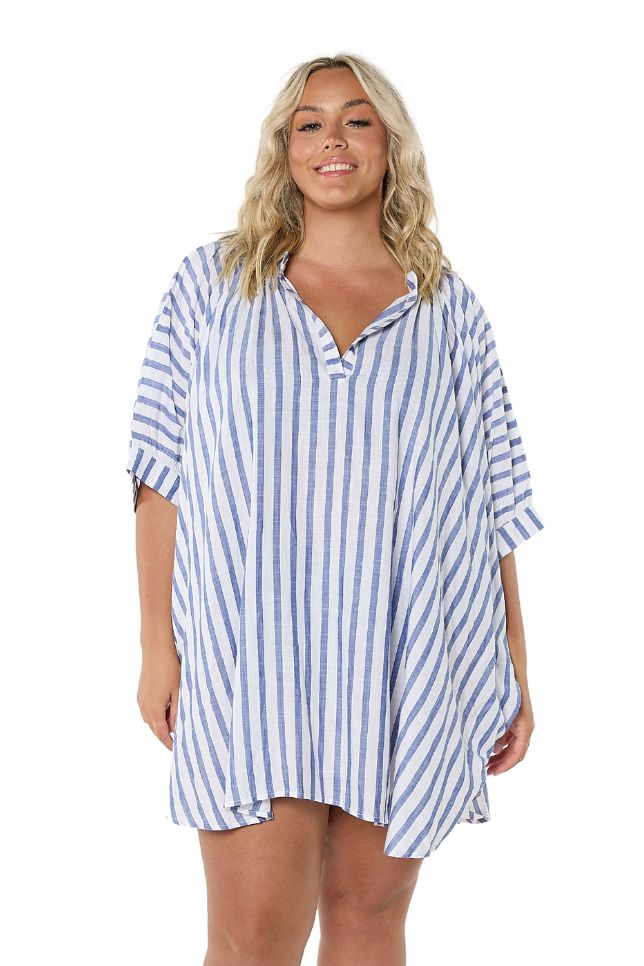 Model wearing navy and white striped cover up