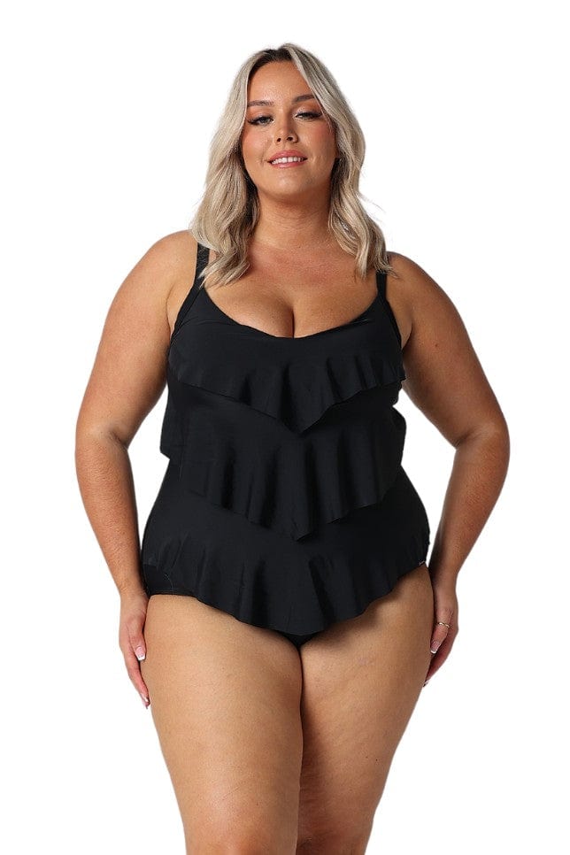 Model wearing black 3 tier one piece