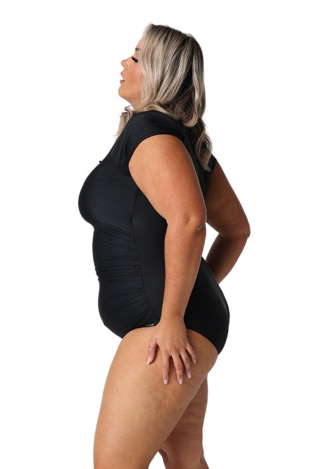 Model showing side of black short sleeve one piece