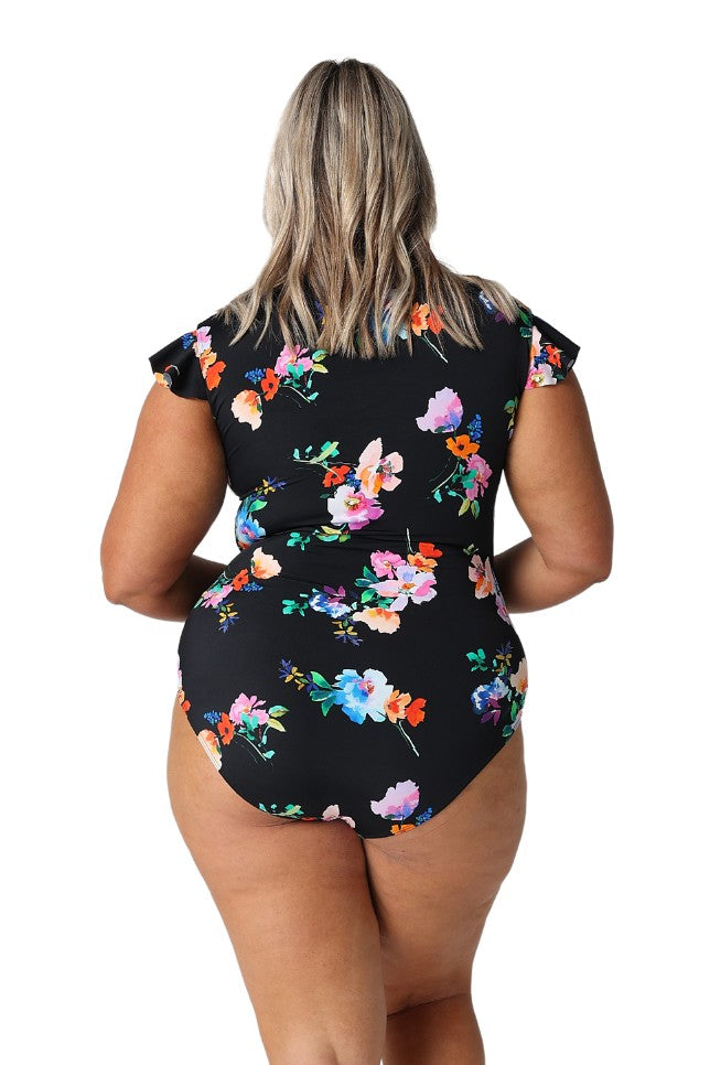 Model showing back of black floral frill sleeve swimsuit