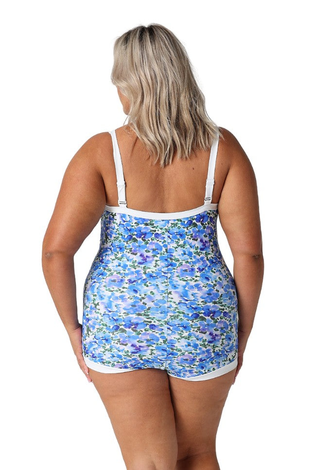 Model showing back of blue floral boyleg one piece