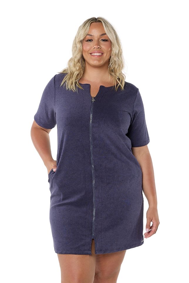 Model wearing navy terry towelling zip front dress