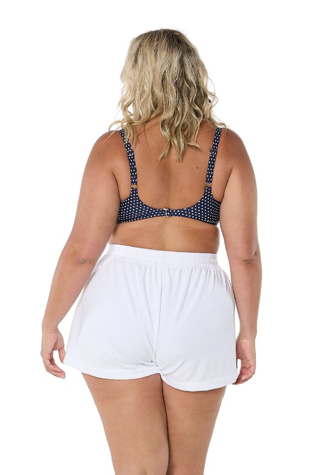 Model showing back of white terry towelling shorts