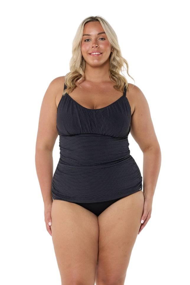 Blonde model wearing black honey comb textured underwire tankini