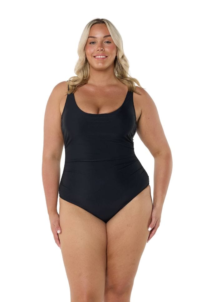 Blonde model wearing black scooped underwire one piece