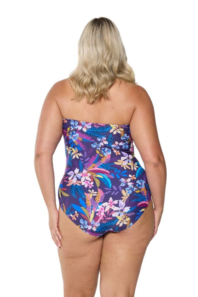 model showing back of navy floral strapless one piece