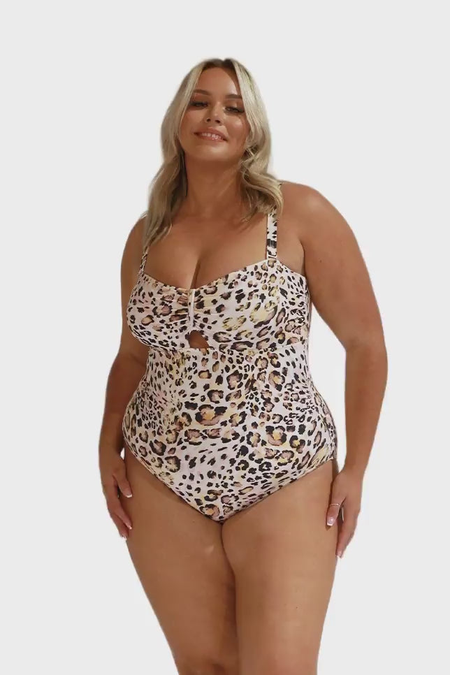 Model wearing leopard print bandeau one piece