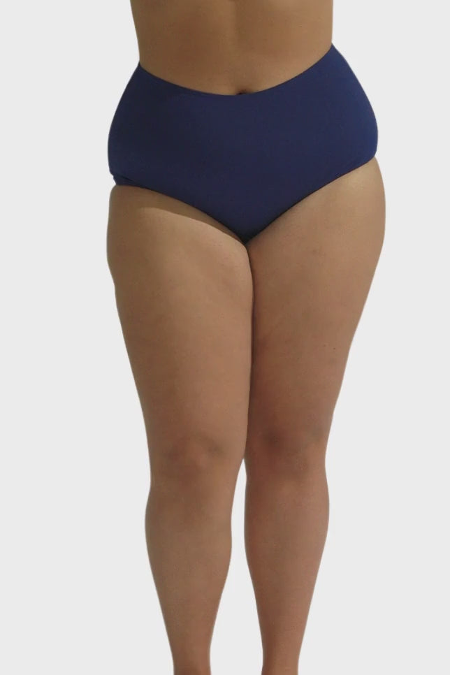 model wearing navy chlorine resistant bikini bottoms